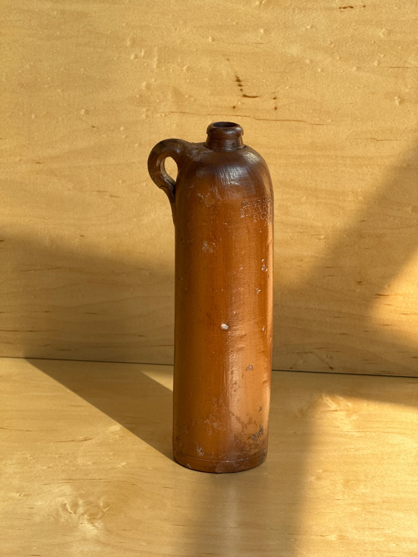 Tall Brown Ceramic Bottle