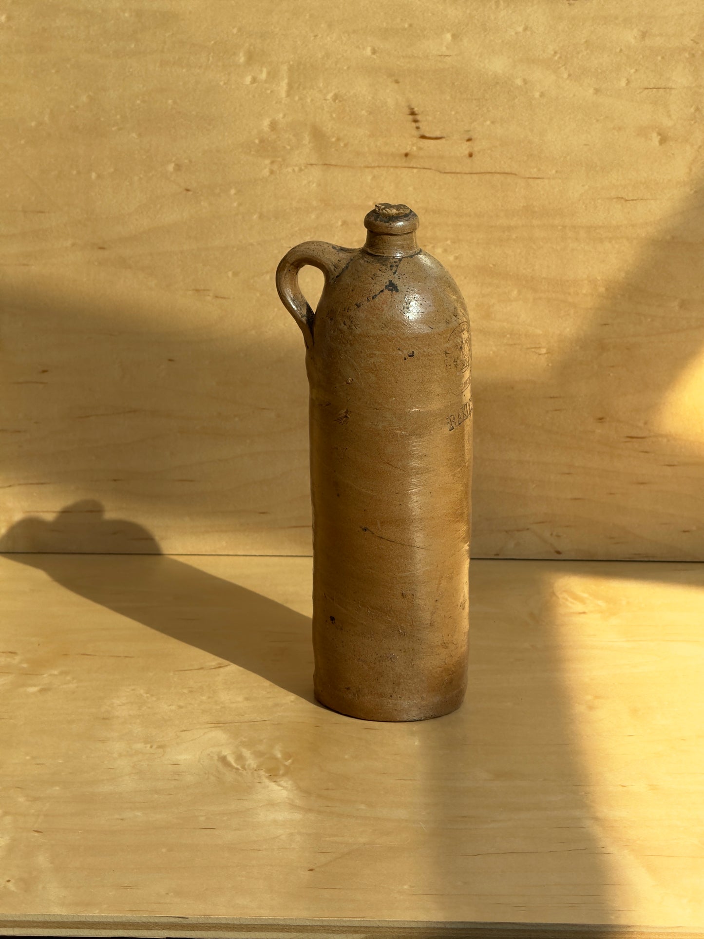 Tall wonky beige bottle 1800s