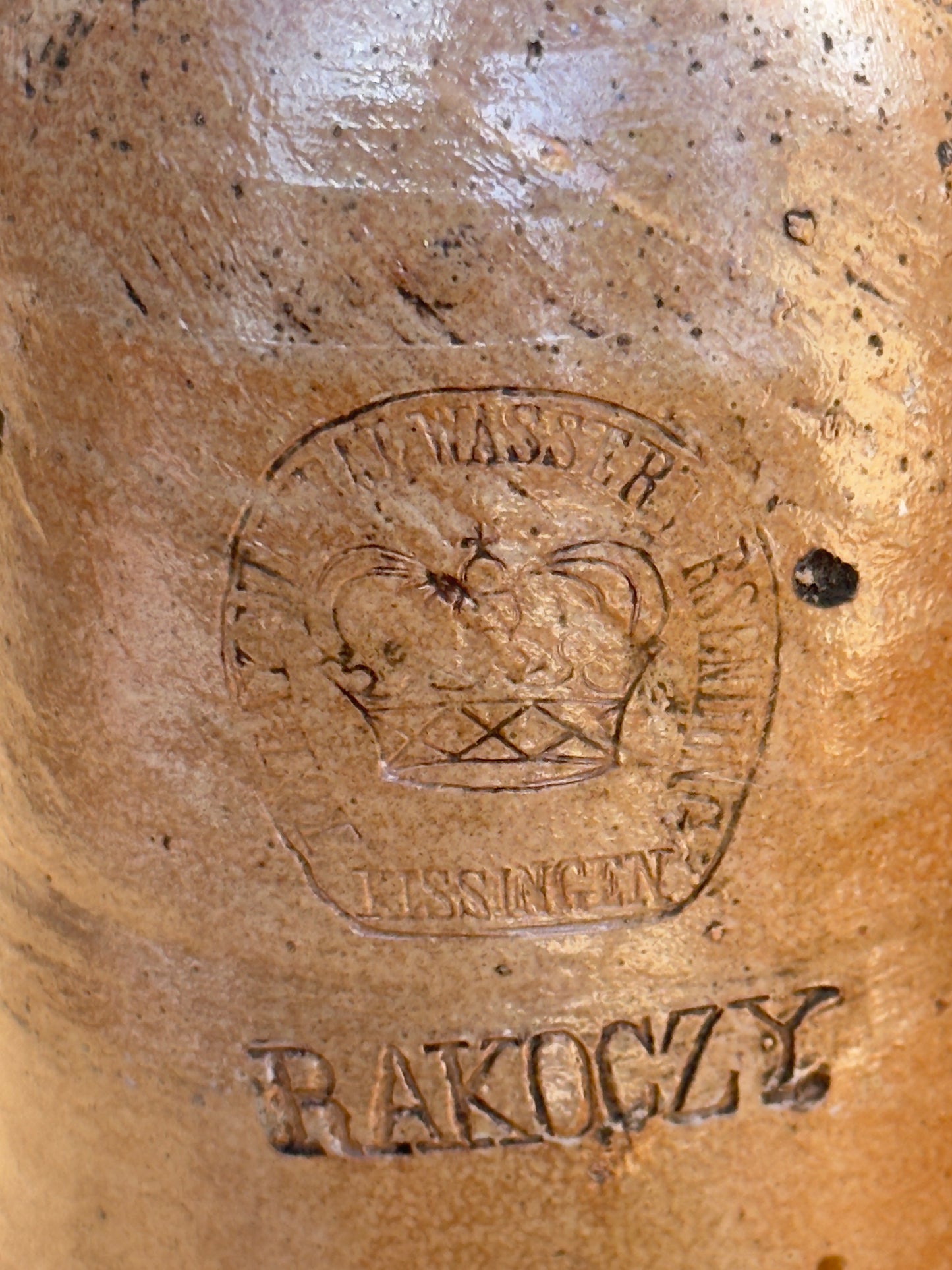 Tall wonky beige bottle 1800s