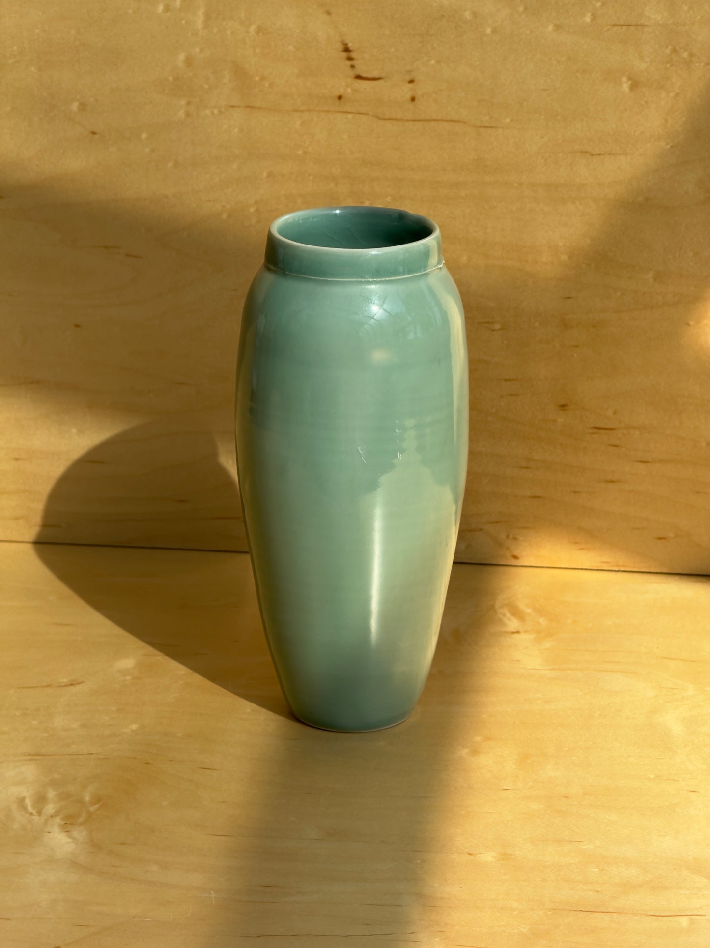 Tall celadon vase