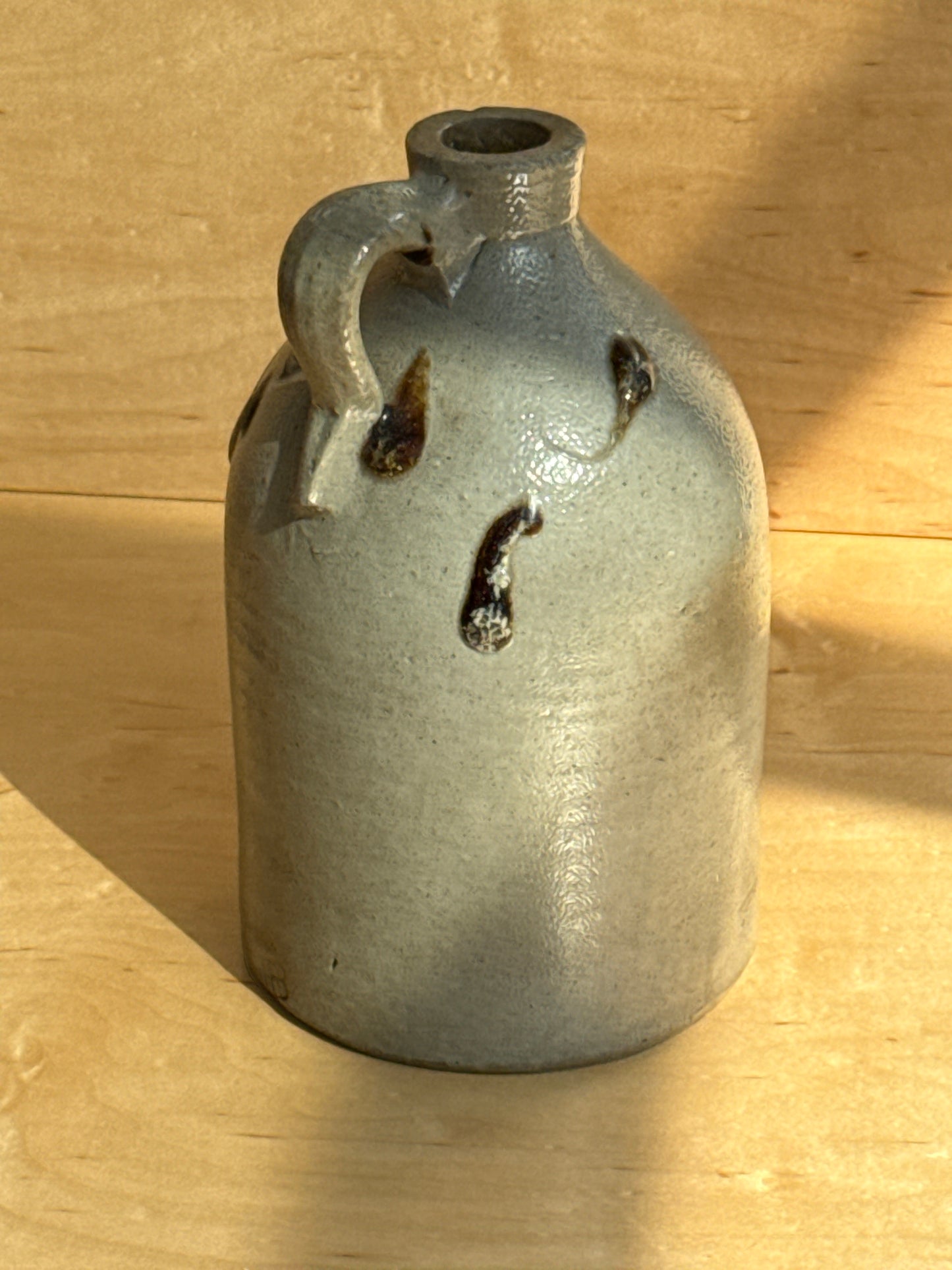 Beige stoneware jug with swirls