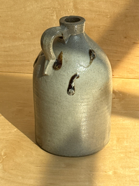 Beige stoneware jug with swirls