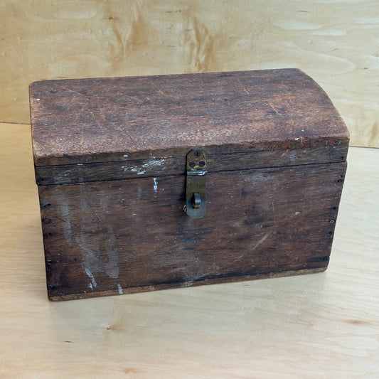 Wooden box with hinged lid and clasp