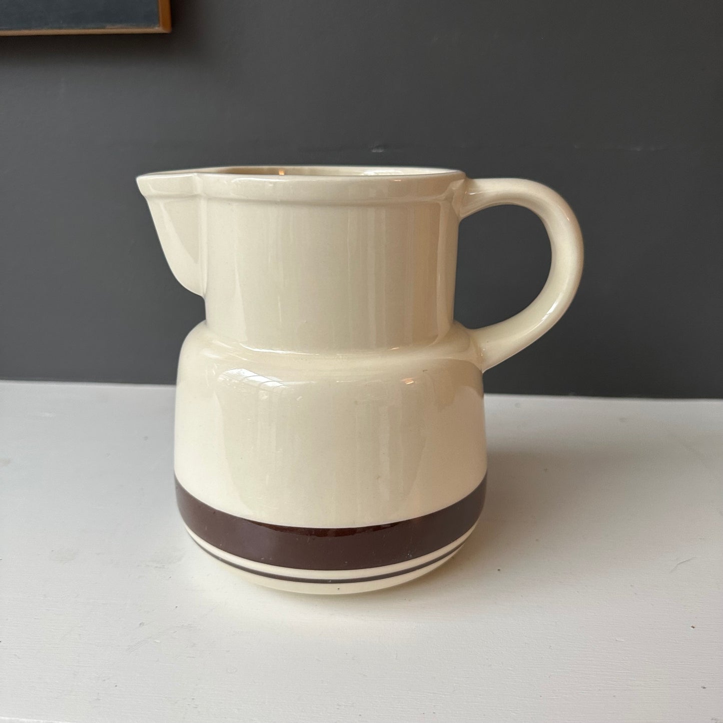 White McCoy Pitcher with brown stripes