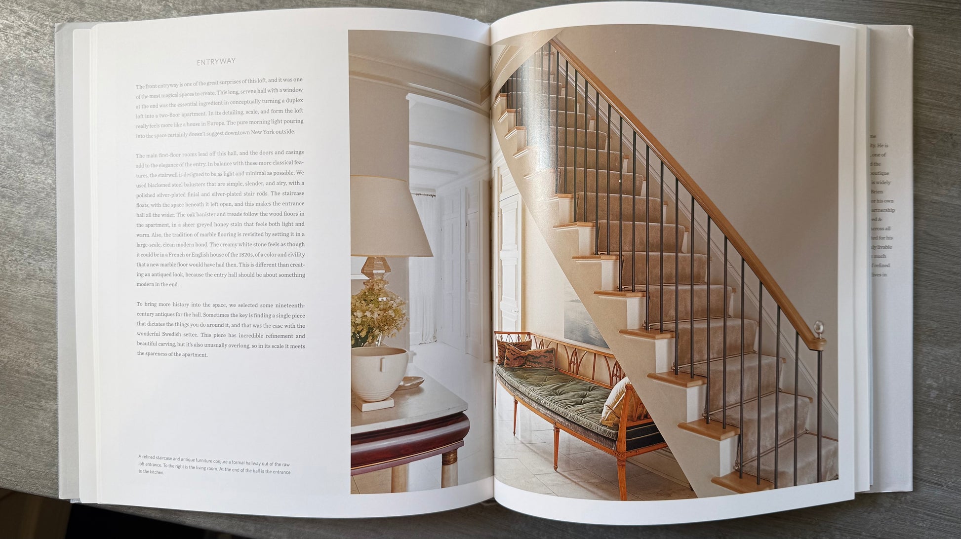 Open book with text and image of attractive staircase with bench beneath. 