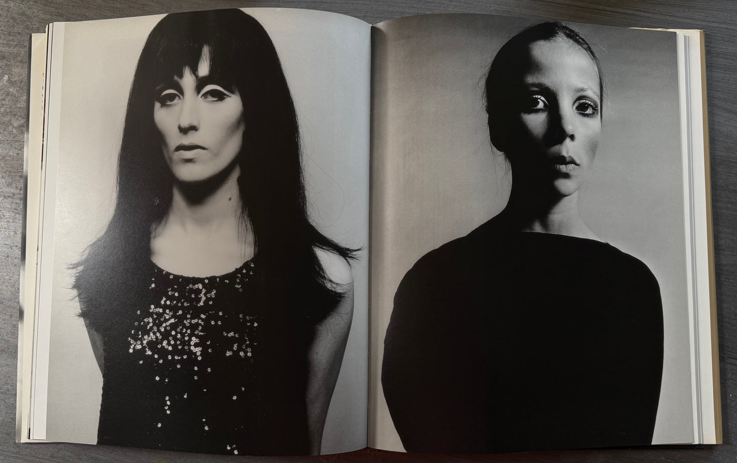 Double page spread of black and white photos of models.