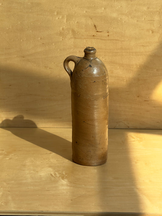 Tall wonky beige bottle 1800s