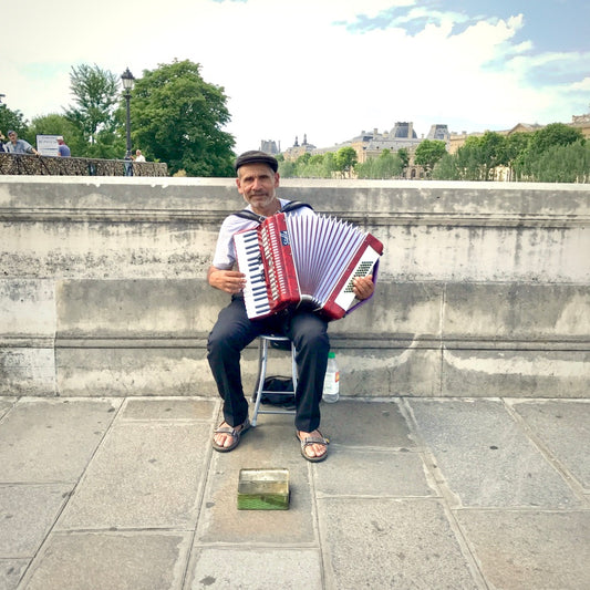 Man with Accordion, Pont Neuf Paris, 2017 by John Lawler
